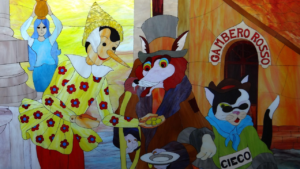 Mehr über den Artikel erfahren Disneys Pinocchio: vom Schlaraffenland,  Arbeitsethos, Amerikanern im zweiten Weltkrieg